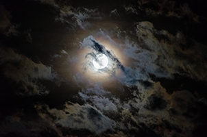 Anthracite Clouds and the Moon